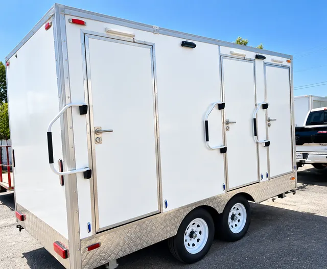 Combination shower-restroom trailer side view