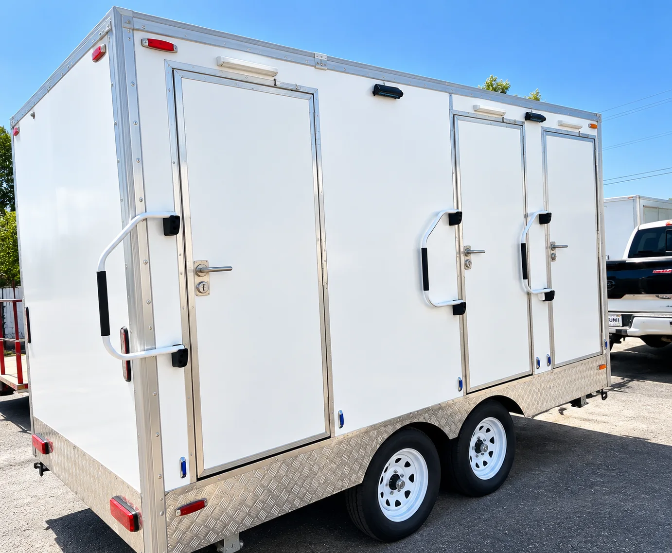 Combination shower-restroom trailer side view